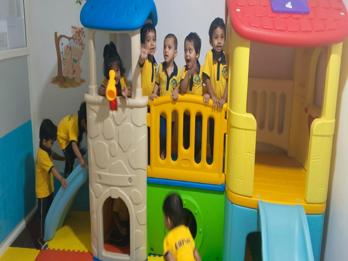 Young learners enjoying the indoor play area