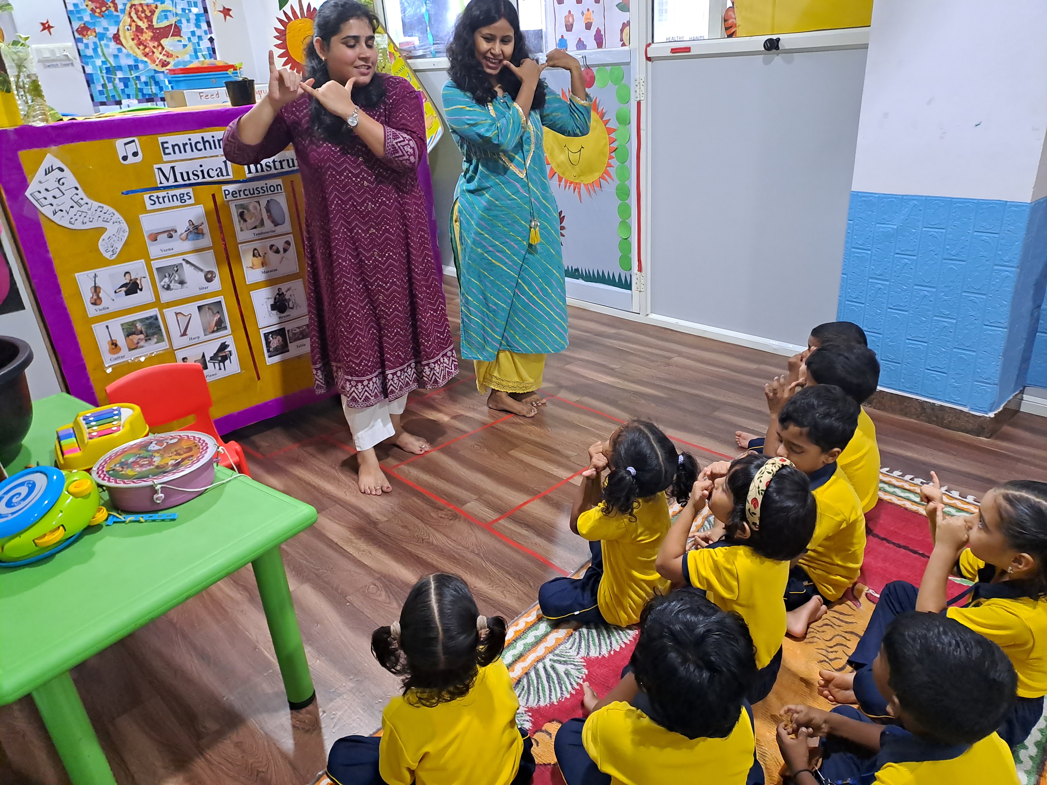 Children exploring rhythm and musical instruments